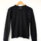black waffle long sleeve tee on a wooden hanger