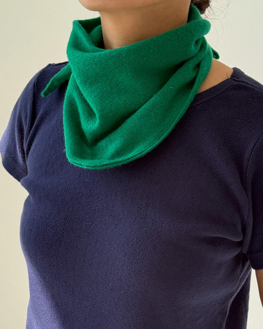model wearing kelly green bandana around their neck
