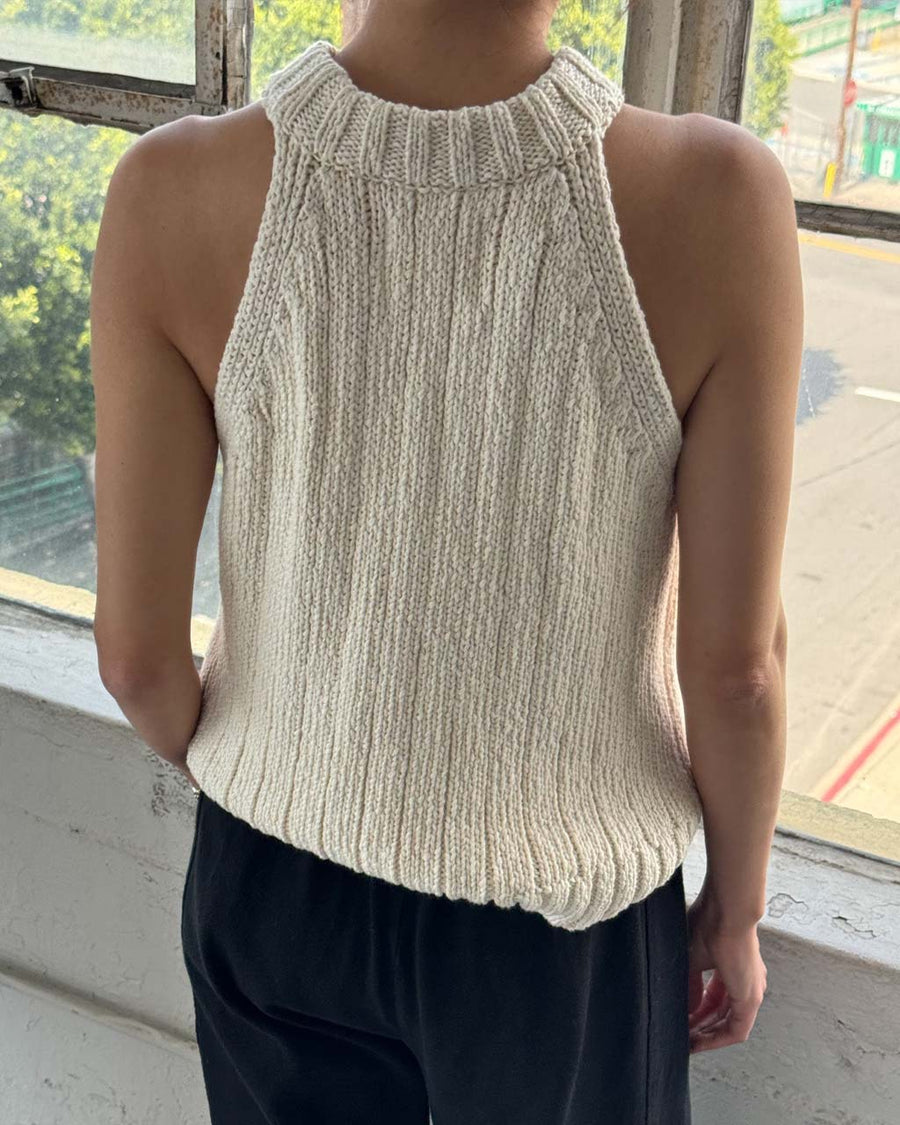 back view of model wearing naturel knit halter sweater top 