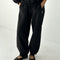 model wearing black french terry balloon cotton pants