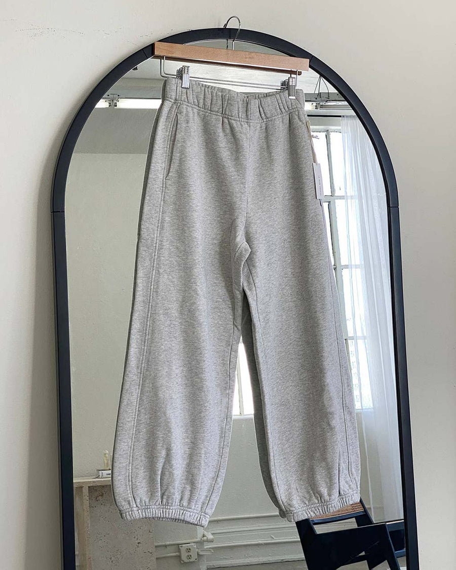 heather grey balloon pants with wide waistband on a hanger