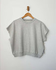 heather grey french terry short sleeve top on a hanger
