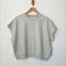 heather grey french terry short sleeve top on a hanger