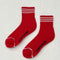 red socks with two white strips on top