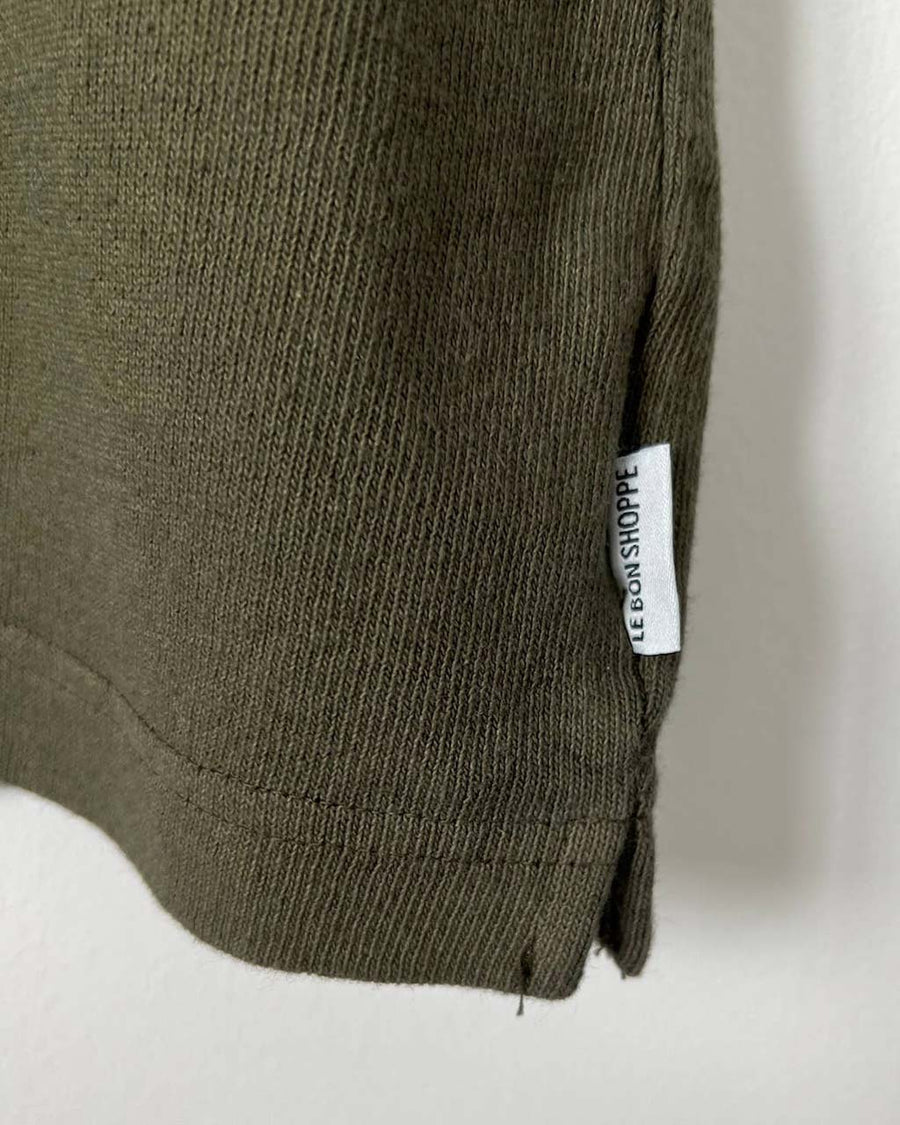 up close of olive green muscle tee