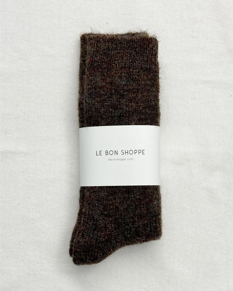 packaged model wearing dark brown  heather slouchy socks