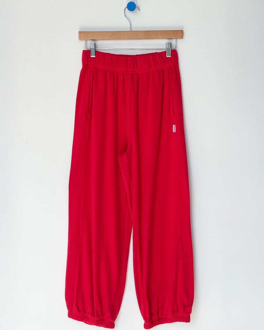 red apple pointelle balloon pants on a hanger