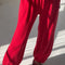 model wearing red apple pointelle balloon pants