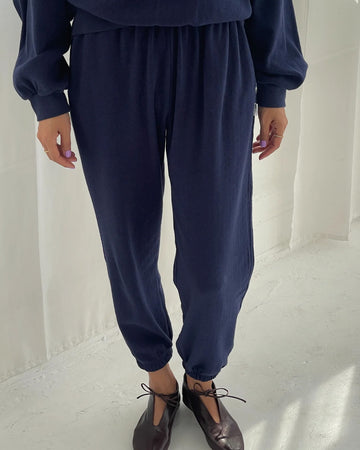 model wearing navy pointelle jogger pants