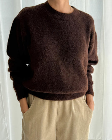 model wearing dark brown mohair pull over sweater