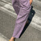 up close of model wearing dried lavender carpenter  cotton pants