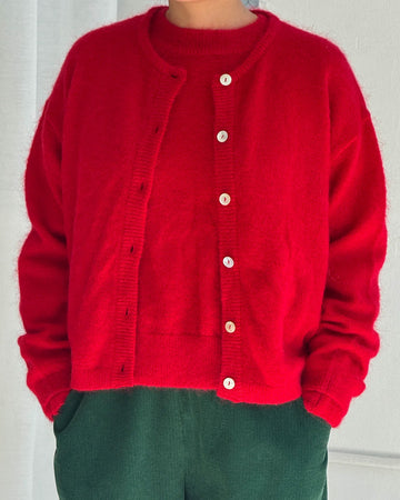 model wearing red mohair cardigan