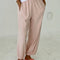 model wearing baby pink pointelle cotton balloon pants