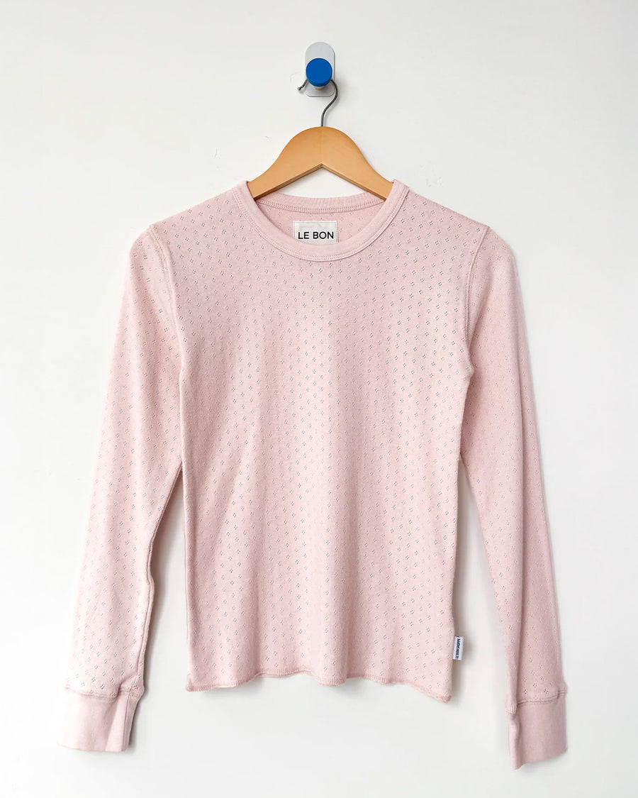 light pink pointelle long sleeve tee on a hanger