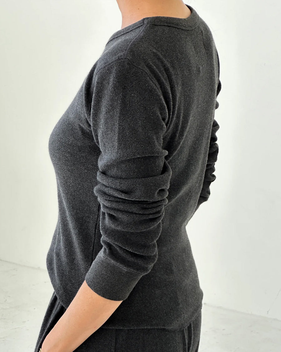 back view of model wearing charcoal pointelle long sleeve tee