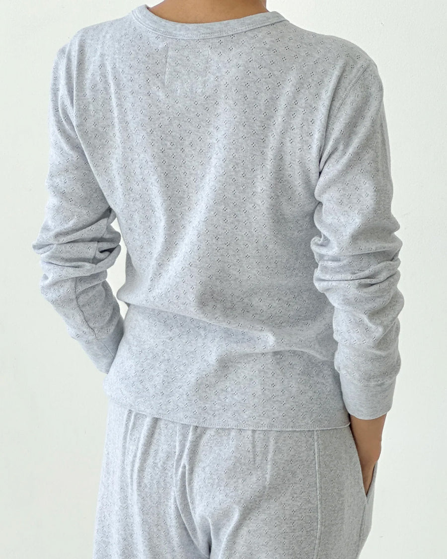 back view of model wearing icy grey pointelle long sleeve tee