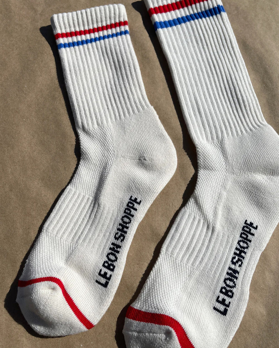 white ribbed socks with red and blue stripes