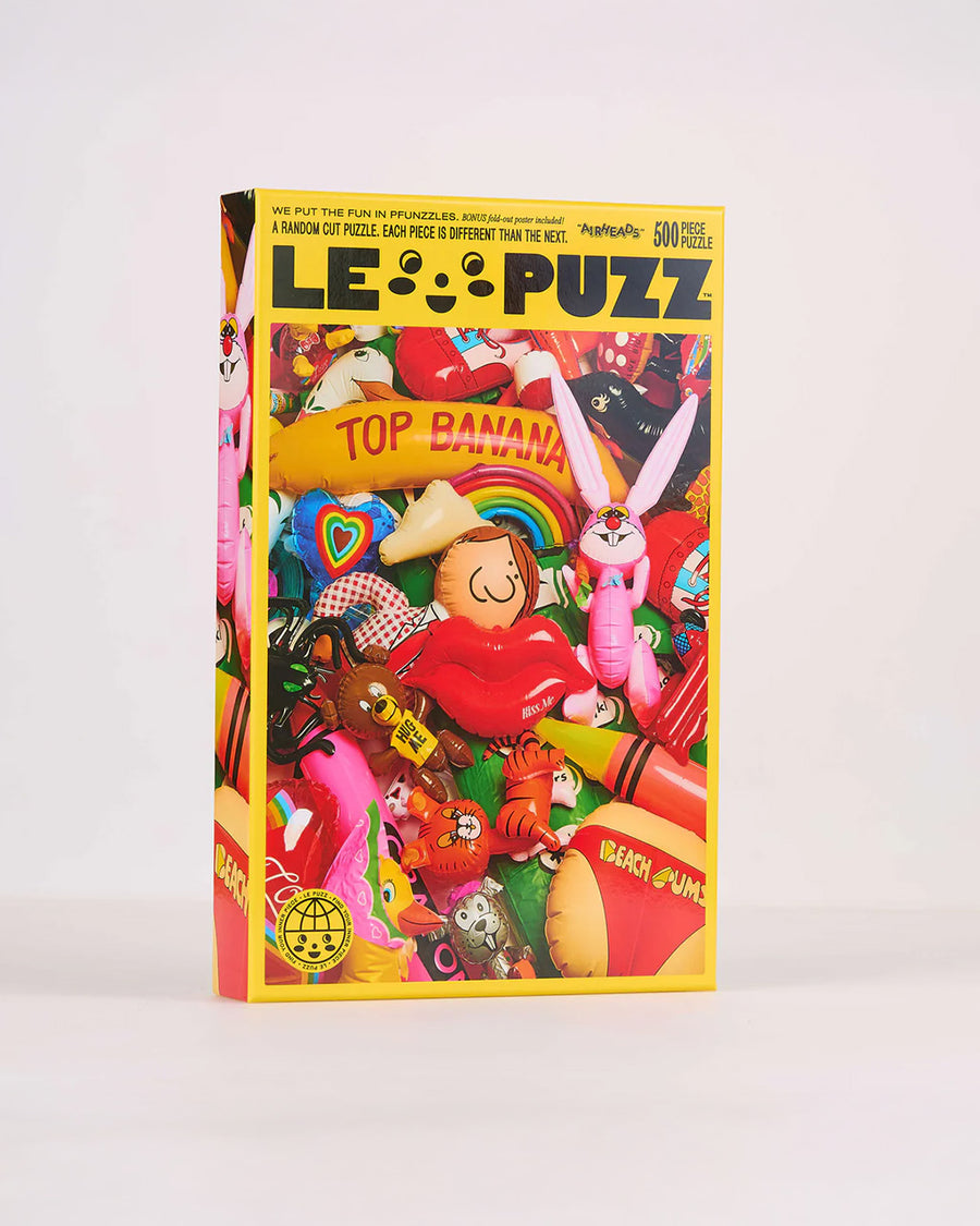 500 piece puzzle with realistic colorful retro inflatables piled on each other