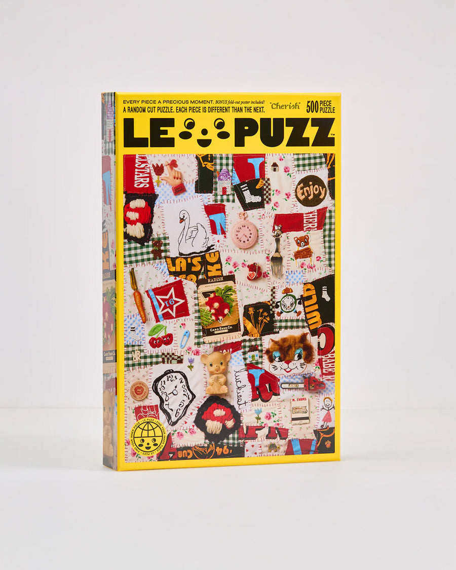 500 piece puzzle with various textiles and trinkets