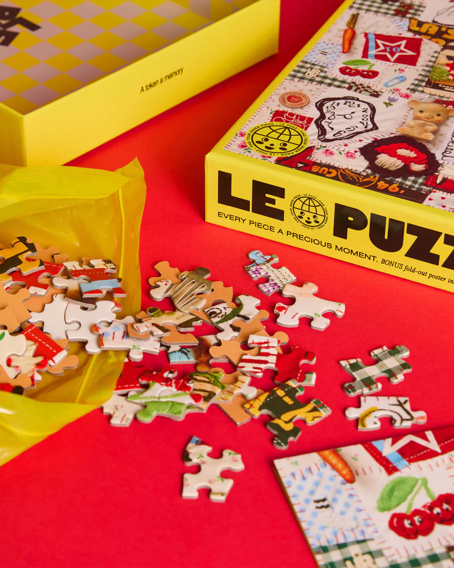 various pieces of 500 piece puzzle with various textiles and trinkets