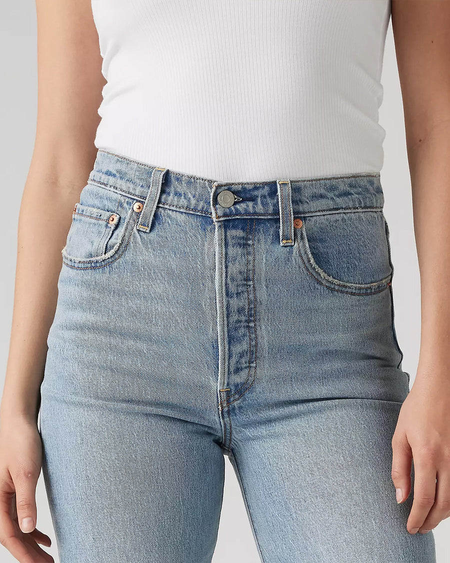 up close of front of light wash ribcage straight ankle jeans