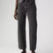 model wearing washed black relaxed fit straight leg jeans