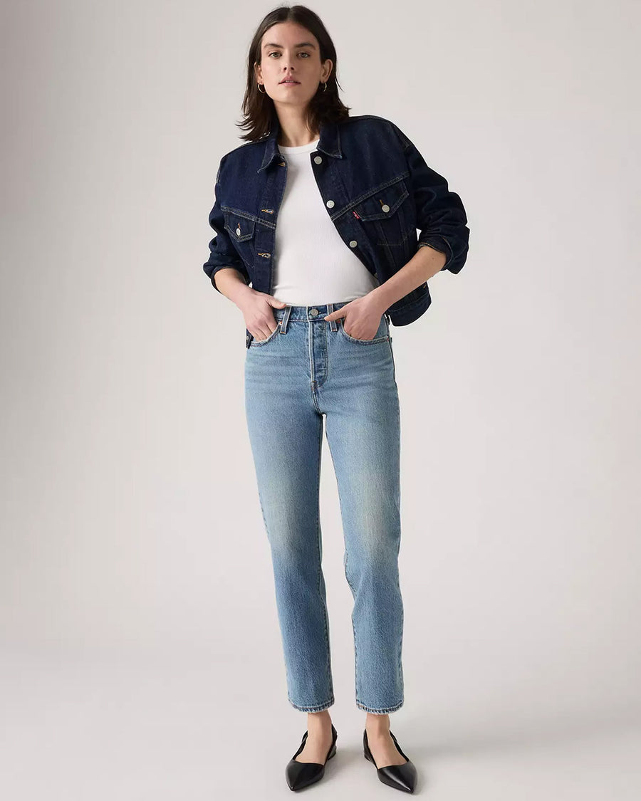 model wearing light denim wedgie straight jeans