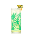 mint vintage palm tree print glass filled with liquid