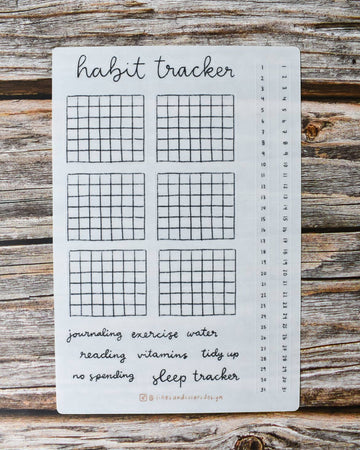 sheet of stickers to track habits like: journaling, exercise, no spending, and water