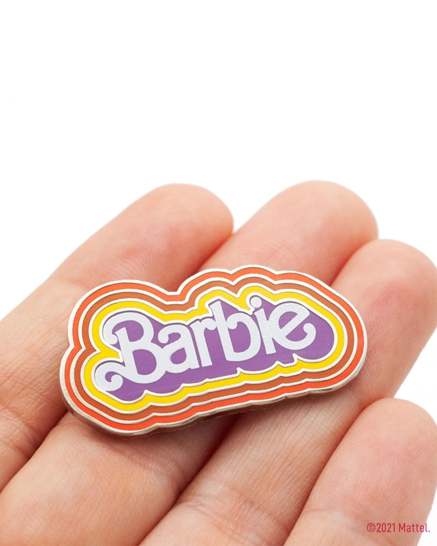 model holding retro color 'Barbie' pin 