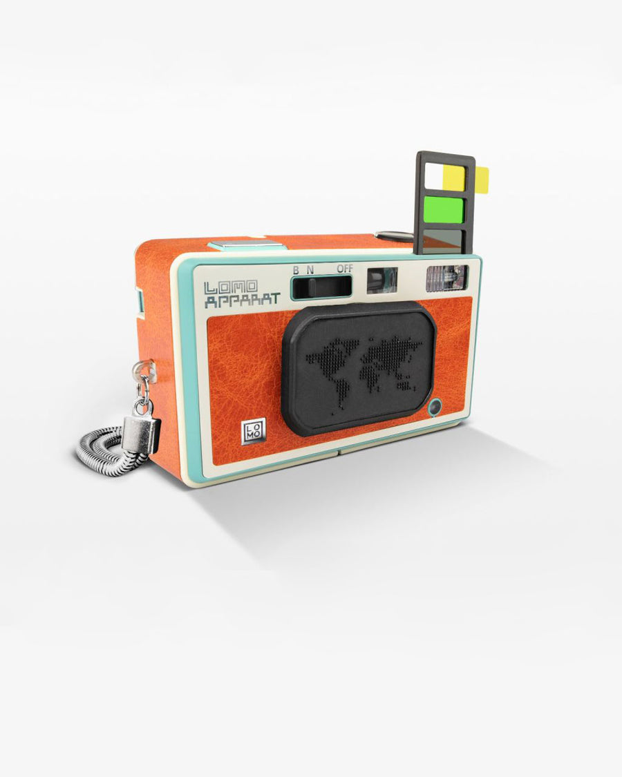 covered lense on orange wide angle camera kit