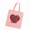 pink 'look for joy' heart tote bag