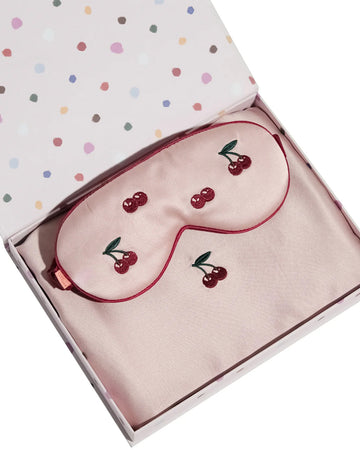 gift box with light pink mulberry silk eye mask with embroidered all over cherry print and pink pillowcase with dainty embroidered cherries on the center