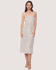 model wearing thin strap silver sequin midi dress with back cutout
