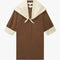 brown oversized trench coat with white and dainty blue folk print tie shawl, arm and hem trim