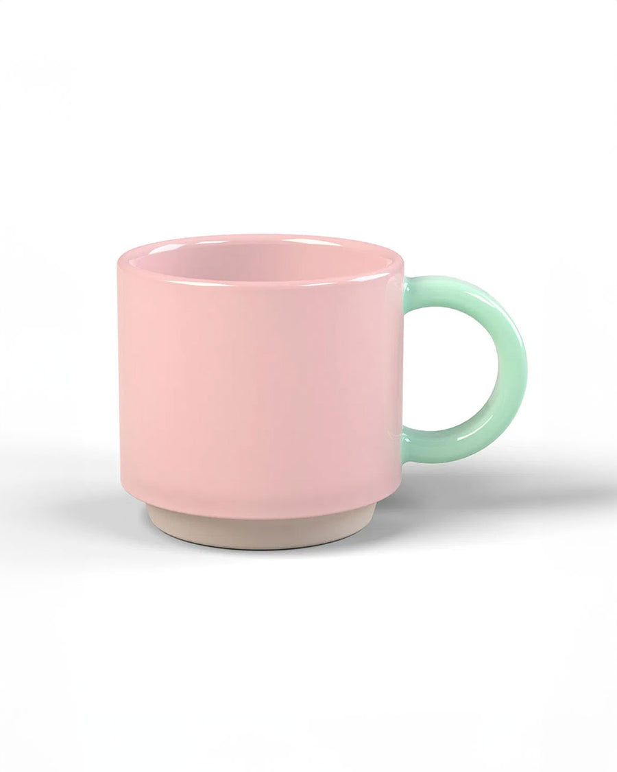pink mug with a mint handle