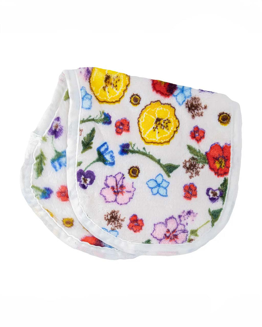 folded white makeup eraser with colorful wildflower print