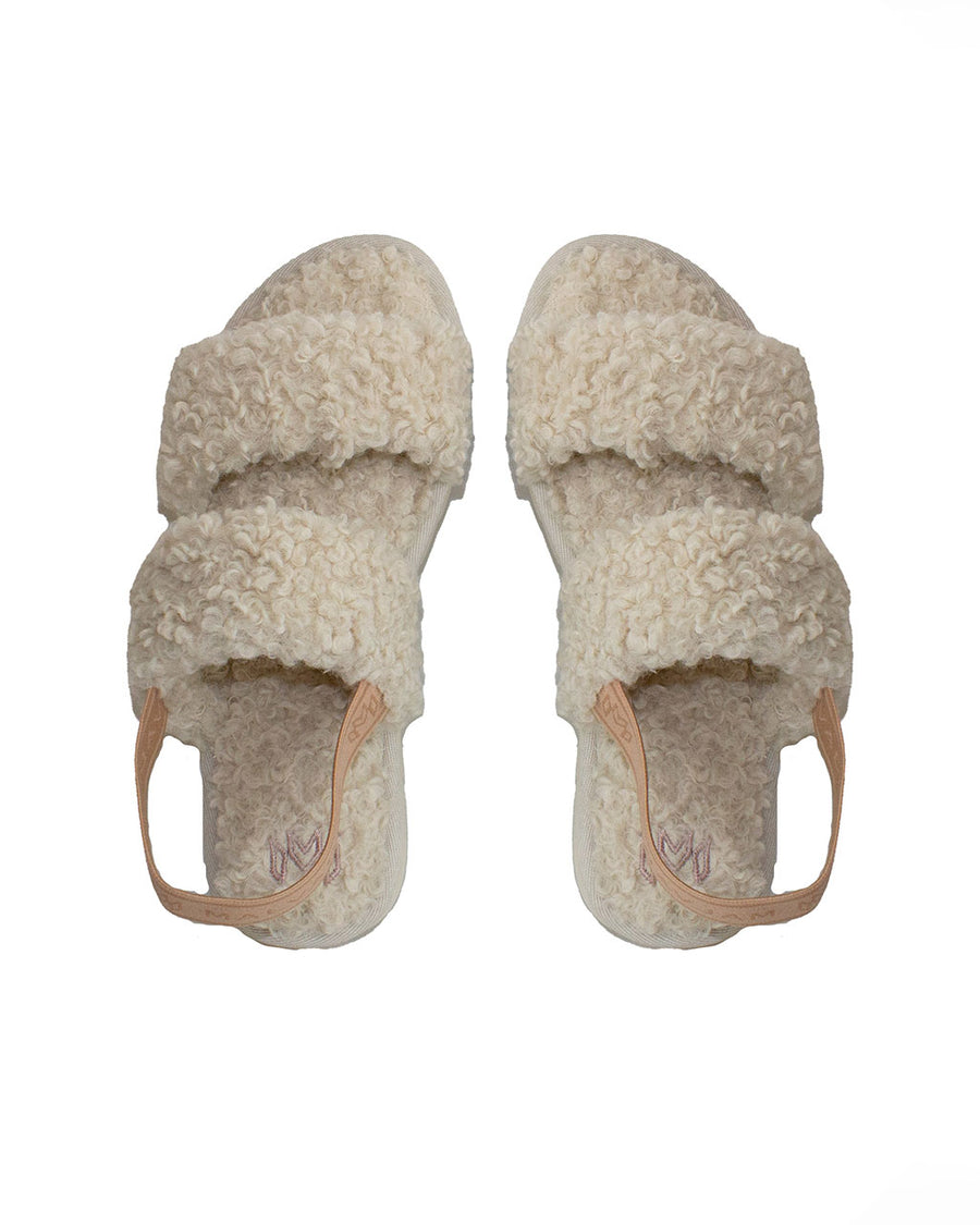 top view of tan faux fur slipper sandals with brown elastic strap