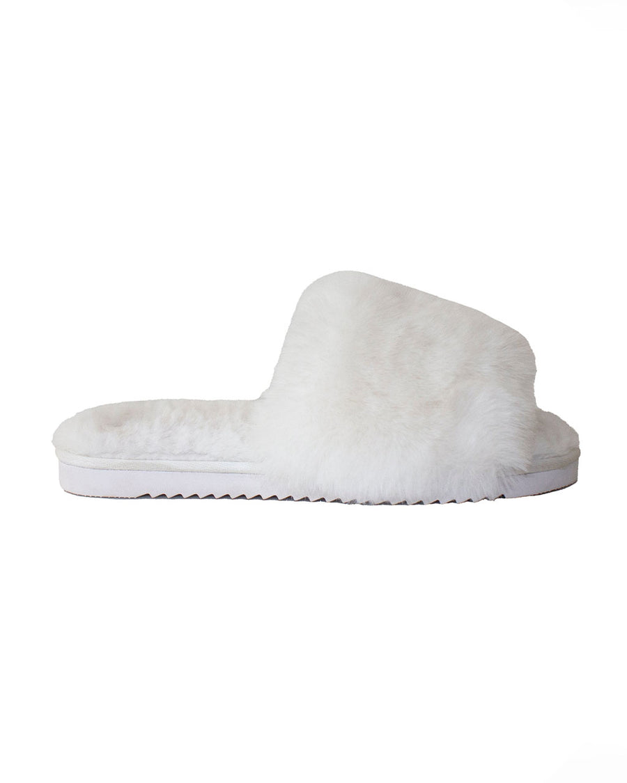 sideview of white faux fur slippers