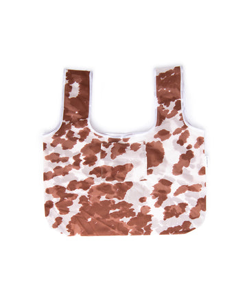 brown and white cow print market bag