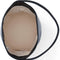 cream interior of model holding black leather bucket bag