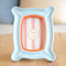 white abstract 4 x 6 picture frame with orange interior trim