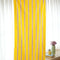 opened yellow towel with lavender stripes