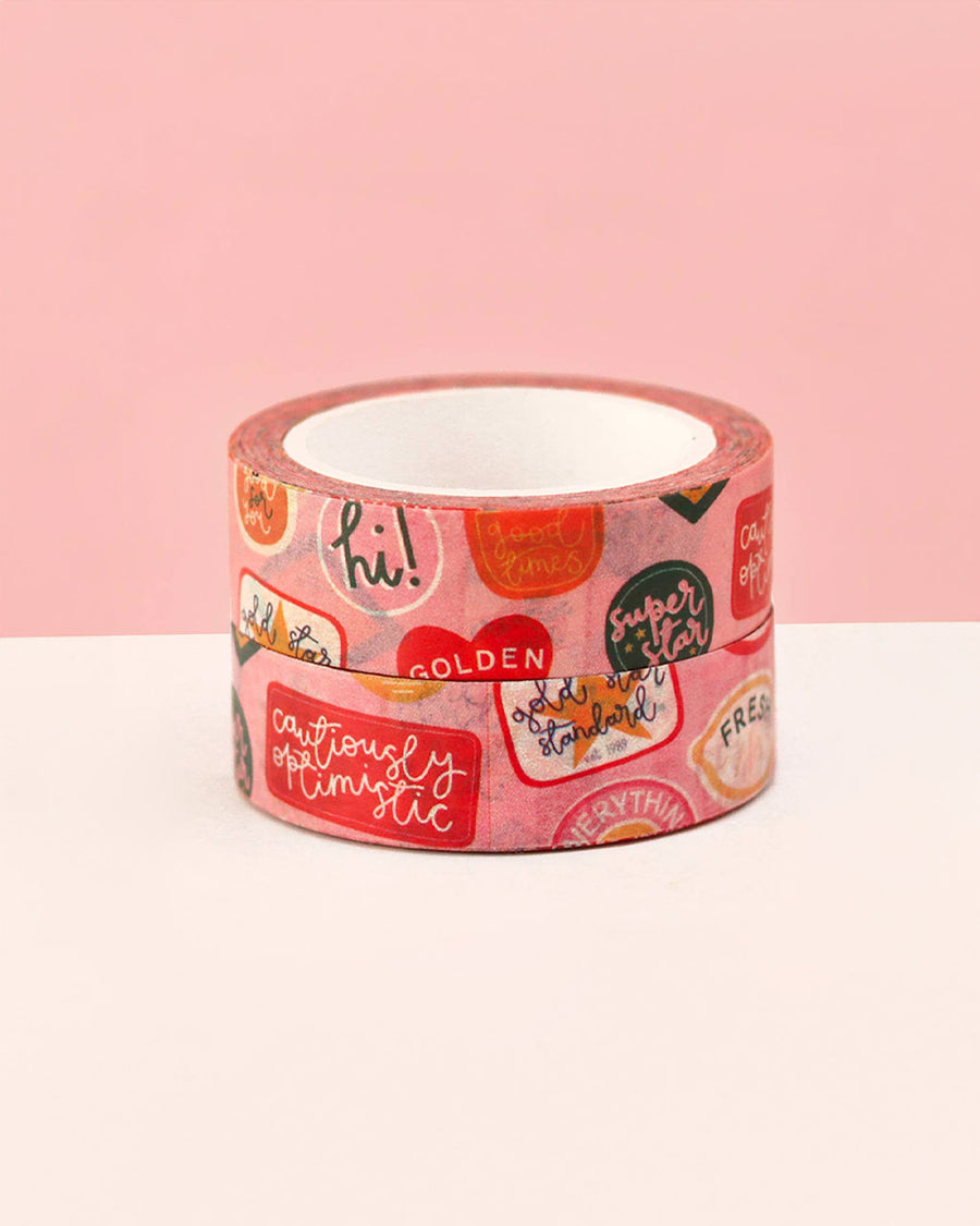 unopened rolls of pink washi tape with cute abstract fruit stickers print