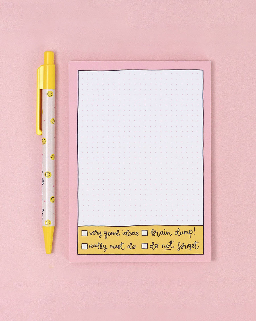grid notepad with pink border and bottom checklist