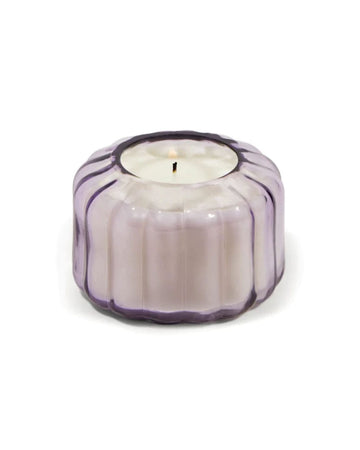 4.5 oz candle in a lavender ripple vessel
