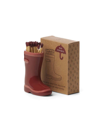 red ceramic rain boot match holder with 25 matches