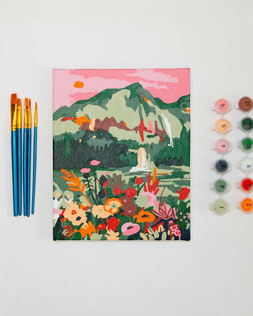 painted mini paint by numbers kit with colorful ella mountain scene with brushes and pots of acrylic paint