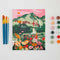 painted mini paint by numbers kit with colorful ella mountain scene with brushes and pots of acrylic paint
