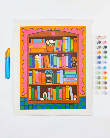 painted paint by numbers kit with colorful bookshelf scene with 5 brushes and paint pots